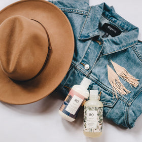 R+Co Dallas lather in hand showing gentle cleansing foam benefit