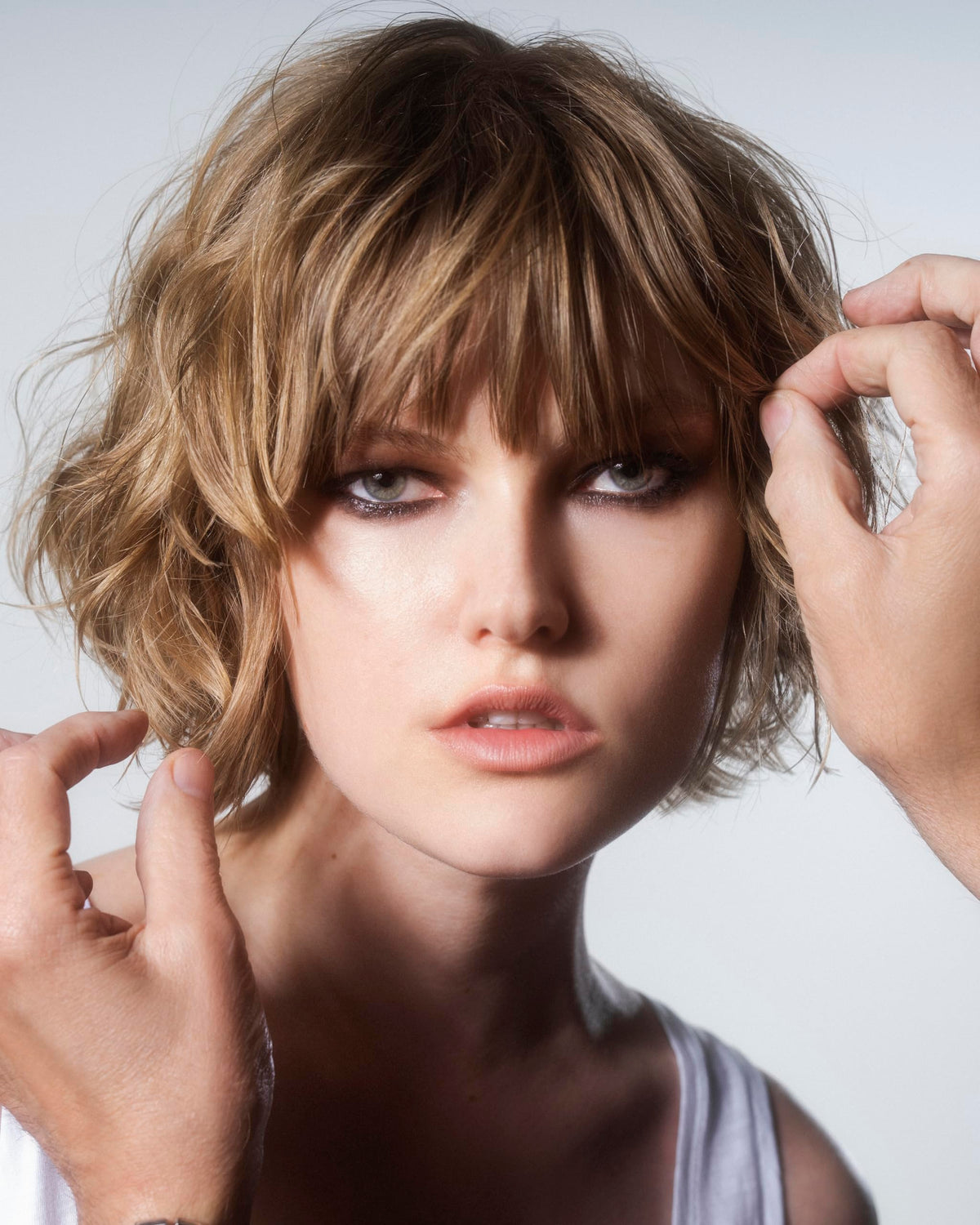 r+co SUN CATCHER sprayed during blowout for smoother, frizz-free finish