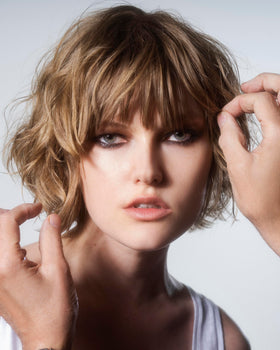 r+co SUN CATCHER sprayed during blowout for smoother, frizz-free finish