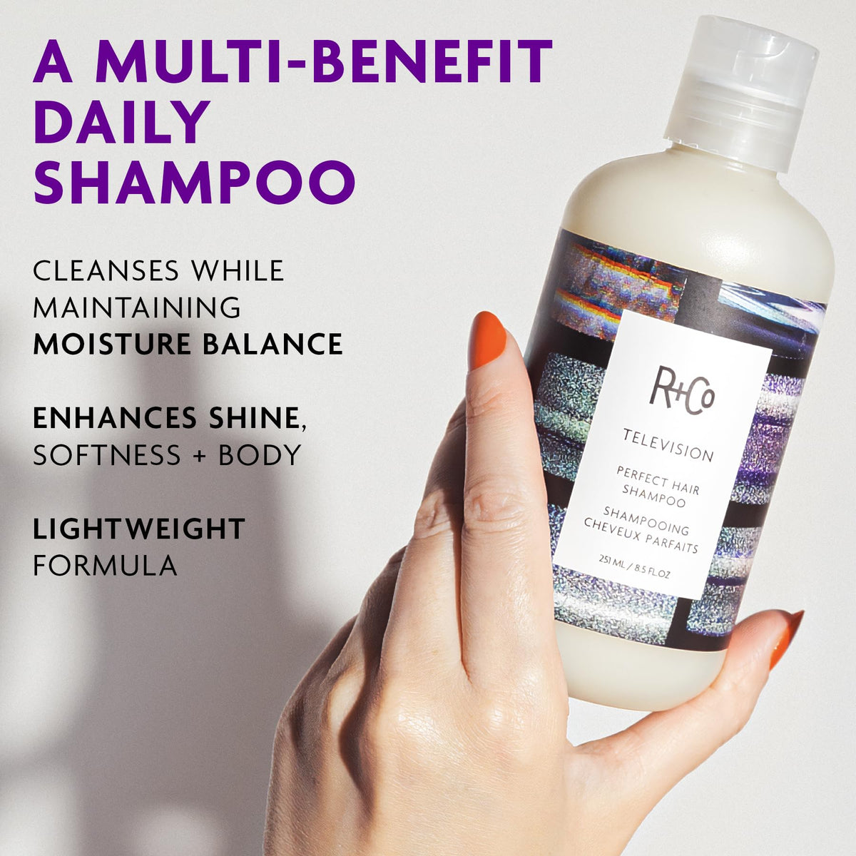 R+Co bottle dispensing shampoo into hand, illustrating easy pump and controlled use