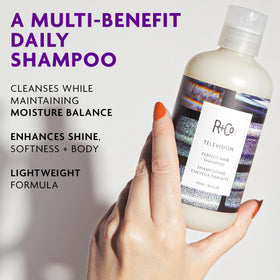 R+Co bottle dispensing shampoo into hand, illustrating easy pump and controlled use