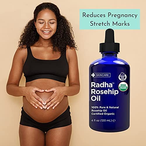 Radha Beauty applying oil to hair ends to demonstrate nourishment and reduced frizz benefit