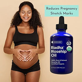 Radha Beauty applying oil to hair ends to demonstrate nourishment and reduced frizz benefit