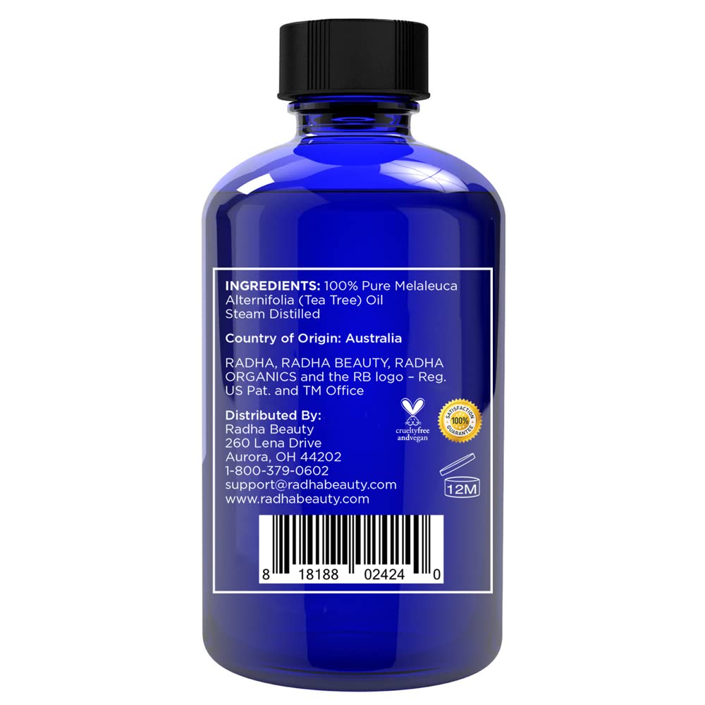 Radha Beauty tea tree dropper dispensing a precise drop for controlled DIY blends
