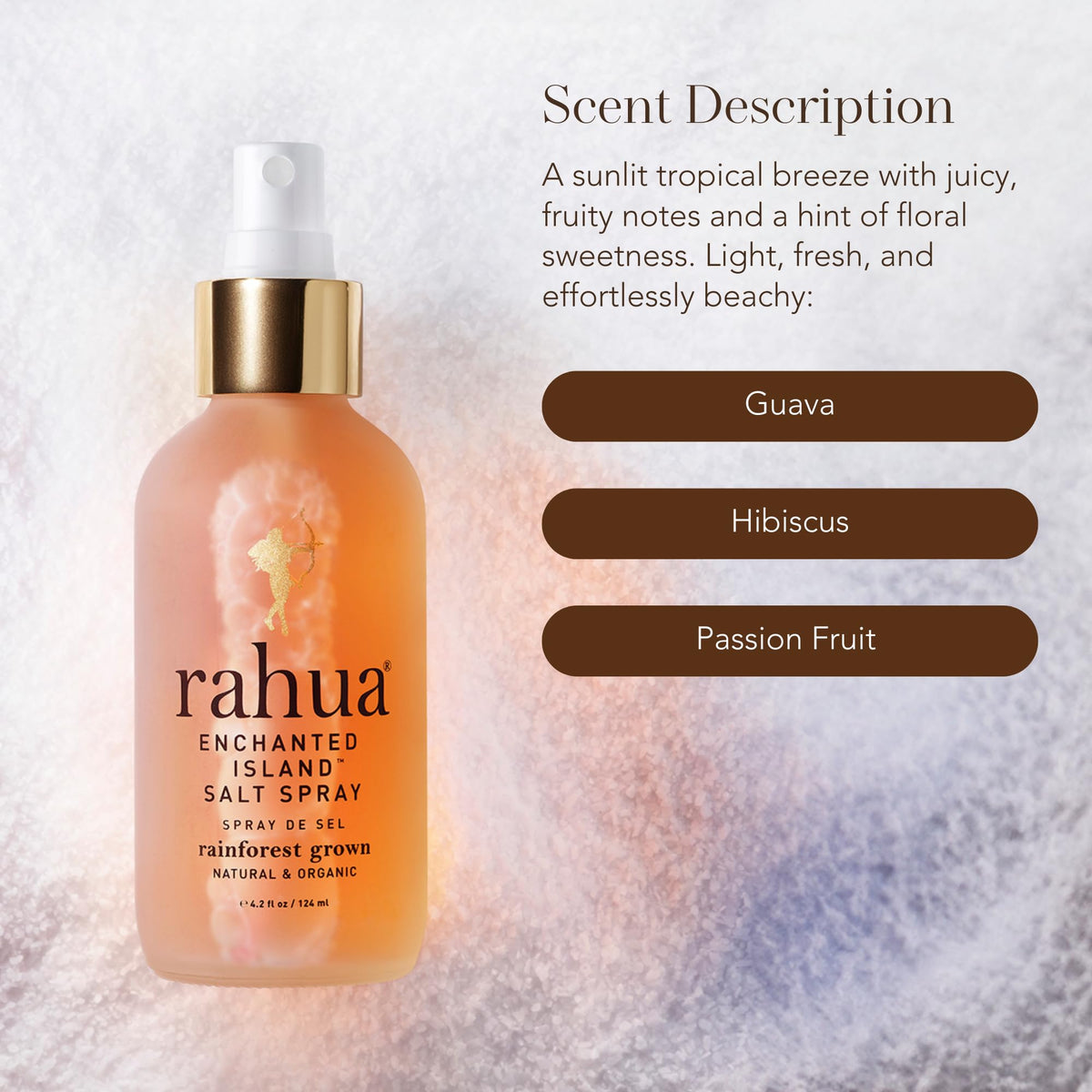 Rahua bottle held in hand to show size and portability for travel-friendly styling