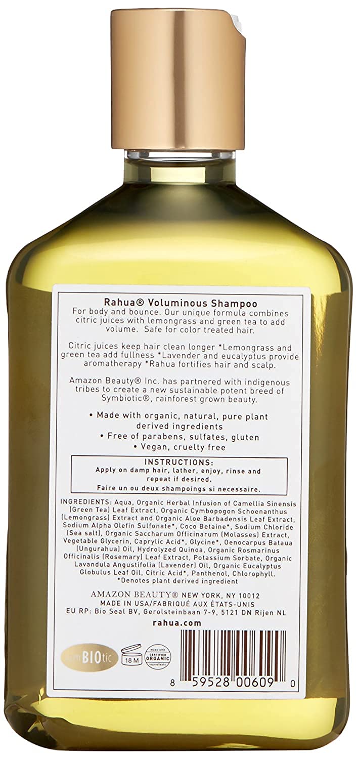 Rahua bottle held to show 9.3 fl oz scale for portion clarity