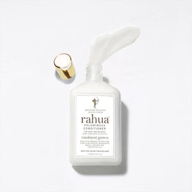 Rahua oil and botanical ingredients displayed to highlight nourishing Omega-9 benefits
