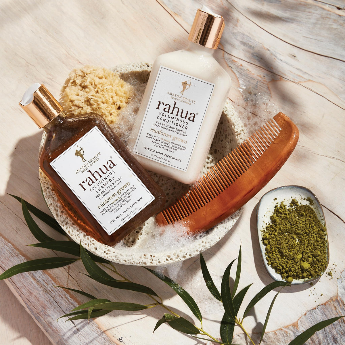Rahua pump dispensing conditioner into hand for easy application and controlled use
