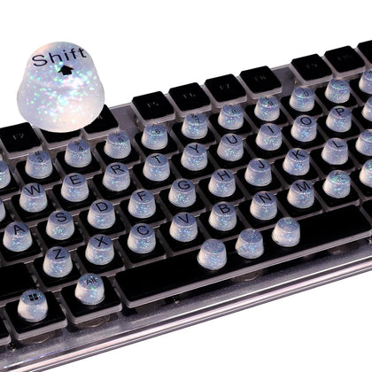 Raised Button front packaging showing clear keycaps and 64-piece set benefit