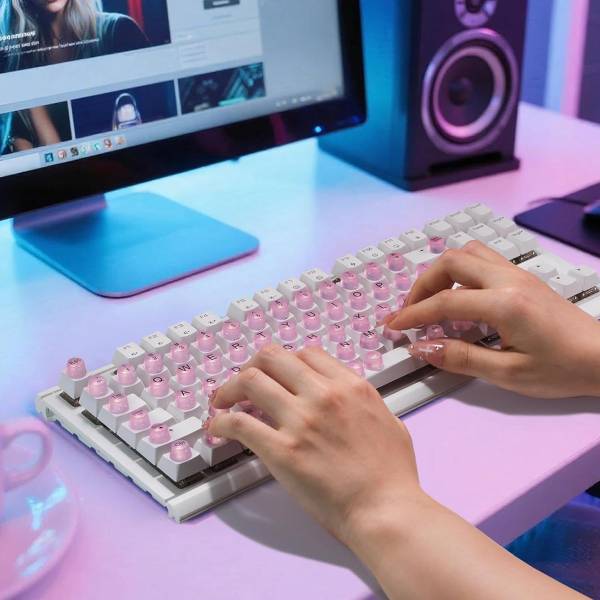 Raised Button keycap next to finger showing size and ergonomic lift benefit
