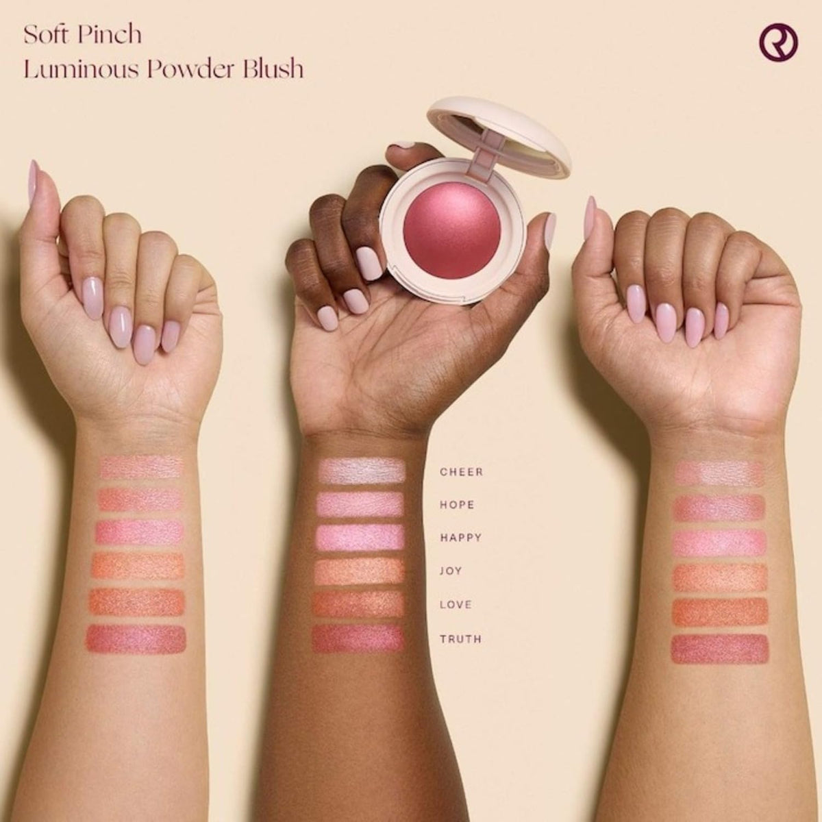 Rare Beauty Cheer beside a coin for size comparison and travel-friendly benefit