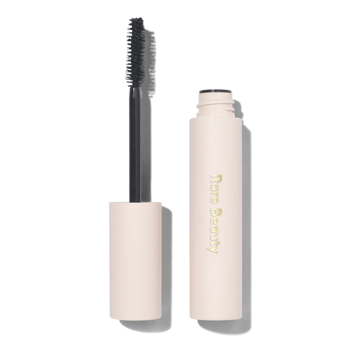 Rare Beauty curved brush close-up demonstrating precise reach for inner and outer lashes