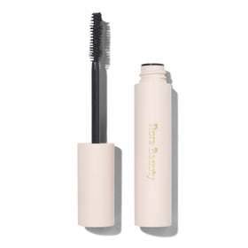 Rare Beauty curved brush close-up demonstrating precise reach for inner and outer lashes