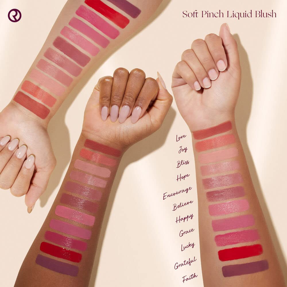 Rare Beauty arm swatch of Happy showing blendable color payoff and buildable natural flush