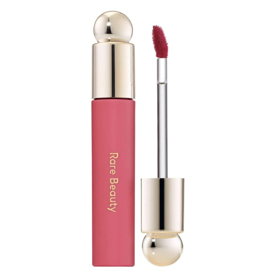 Rare Beauty lip oil front view showing glossy tint and long-lasting hydration