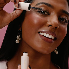 Rare Beauty clear brow gel texture swirl illustrating smooth, flexible hold and finish