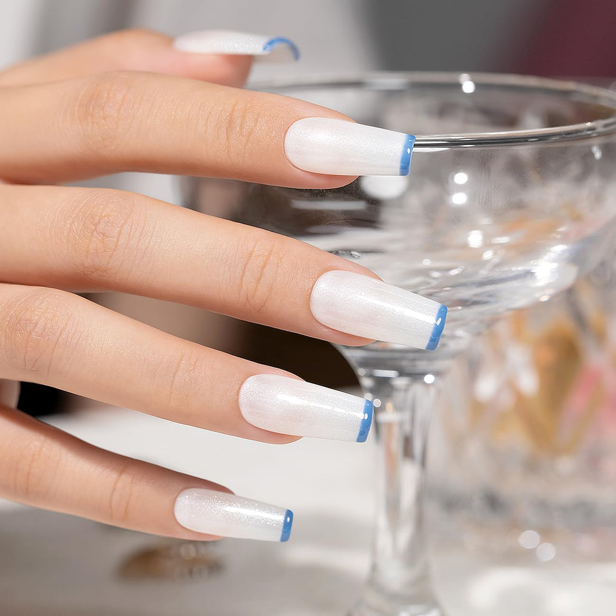 RARJSM nails in use on fingers showcasing subtle shimmer for natural look