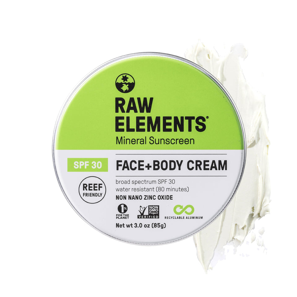 Raw Elements tin front label showing SPF 30 and organic benefits