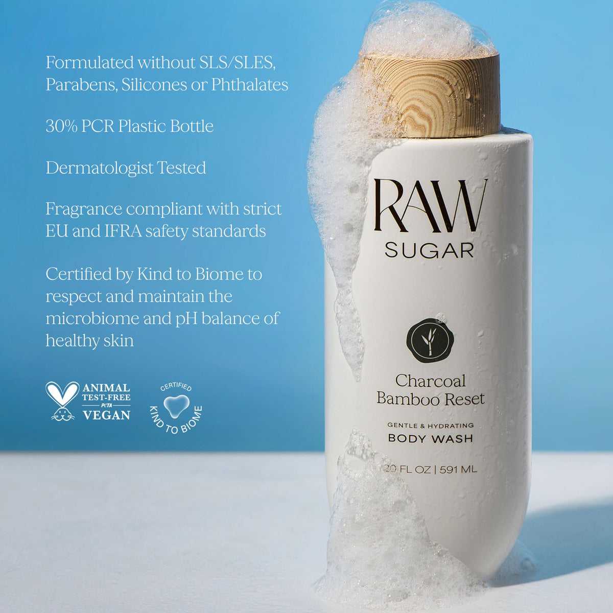 RAW SUGAR bottle next to hand to show 20 fl oz size and value