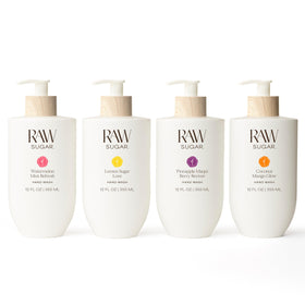 RAW SUGAR bundle front view showing four scented hand wash bottles and stylish bamboo accents, elevates decor