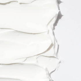 RAW SUGAR applied on hair in shower demonstrating hydration and detangling