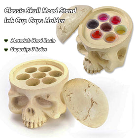 Rayyl skull top removed revealing seven cup slots for secure pigment placement