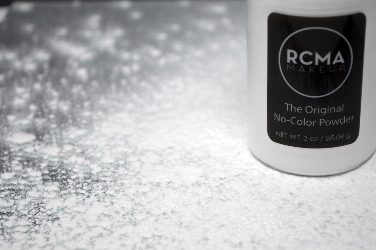 RCMA Makeup application on model pressing powder for long-lasting wear