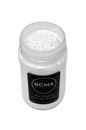 RCMA Makeup powder applied on model’s T-zone, controls shine and appears photo-ready