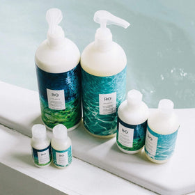 R+Co Atlantis creamy conditioner texture close-up illustrating rich hydration and slip