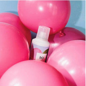 R+Co nozzle close-up highlighting fine mist for even, weightless hold