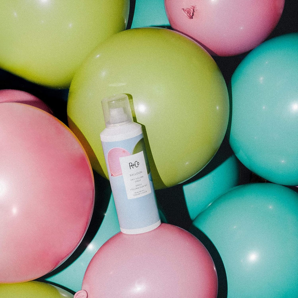R+Co Balloon on vanity during styling showing easy on-the-go use