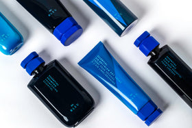 R+Co BLEU air‑dried hair example showing reduced frizz and defined texture