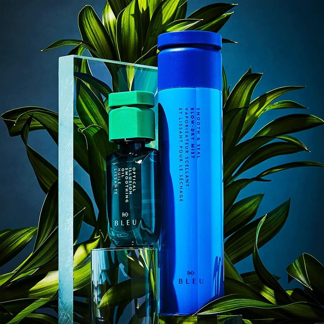 R+Co BLEU mist spraying onto damp hair protecting against heat and frizz