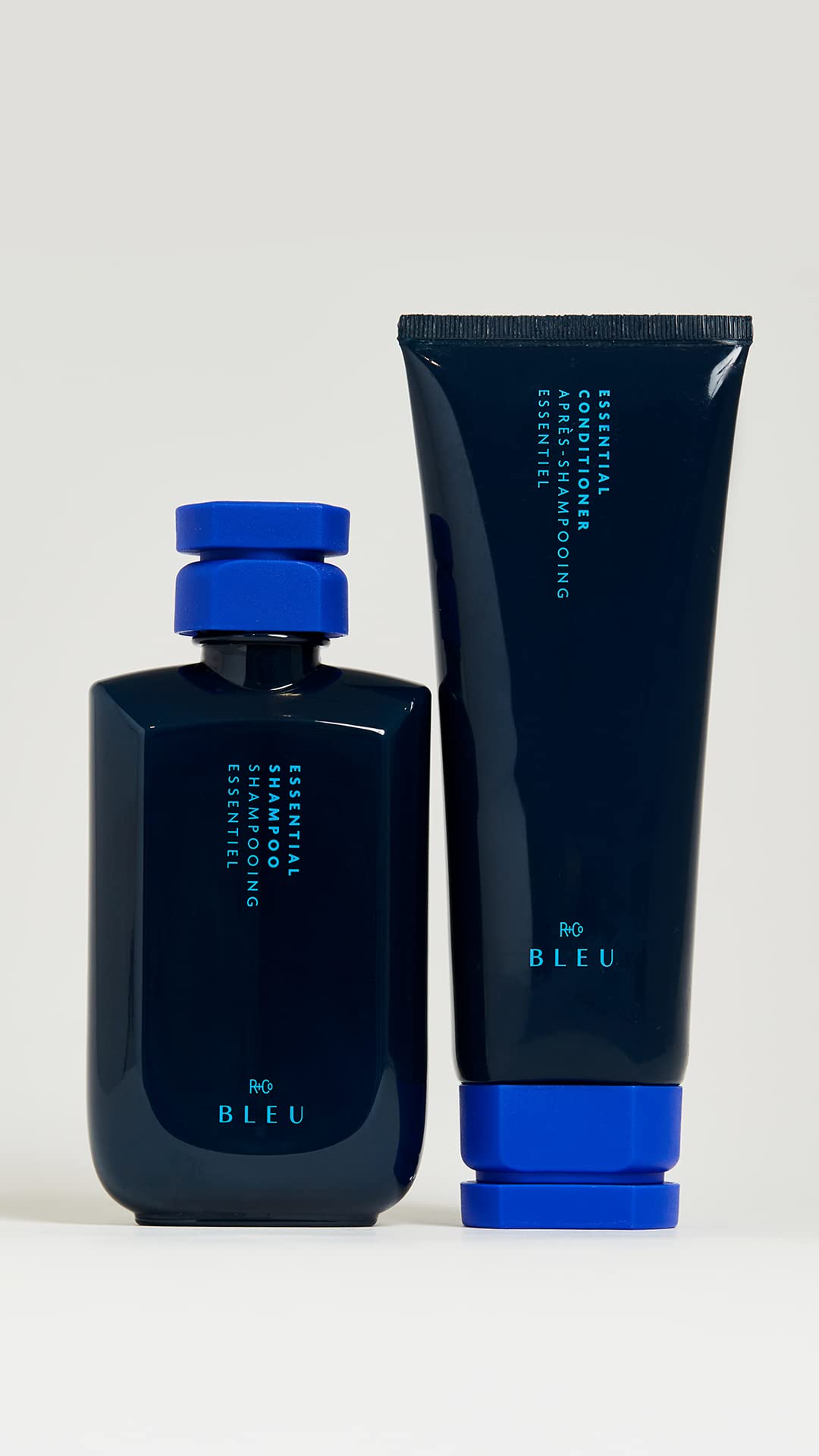 R+Co BLEU conditioner texture being dispensed showing creamy slip that detangles strands