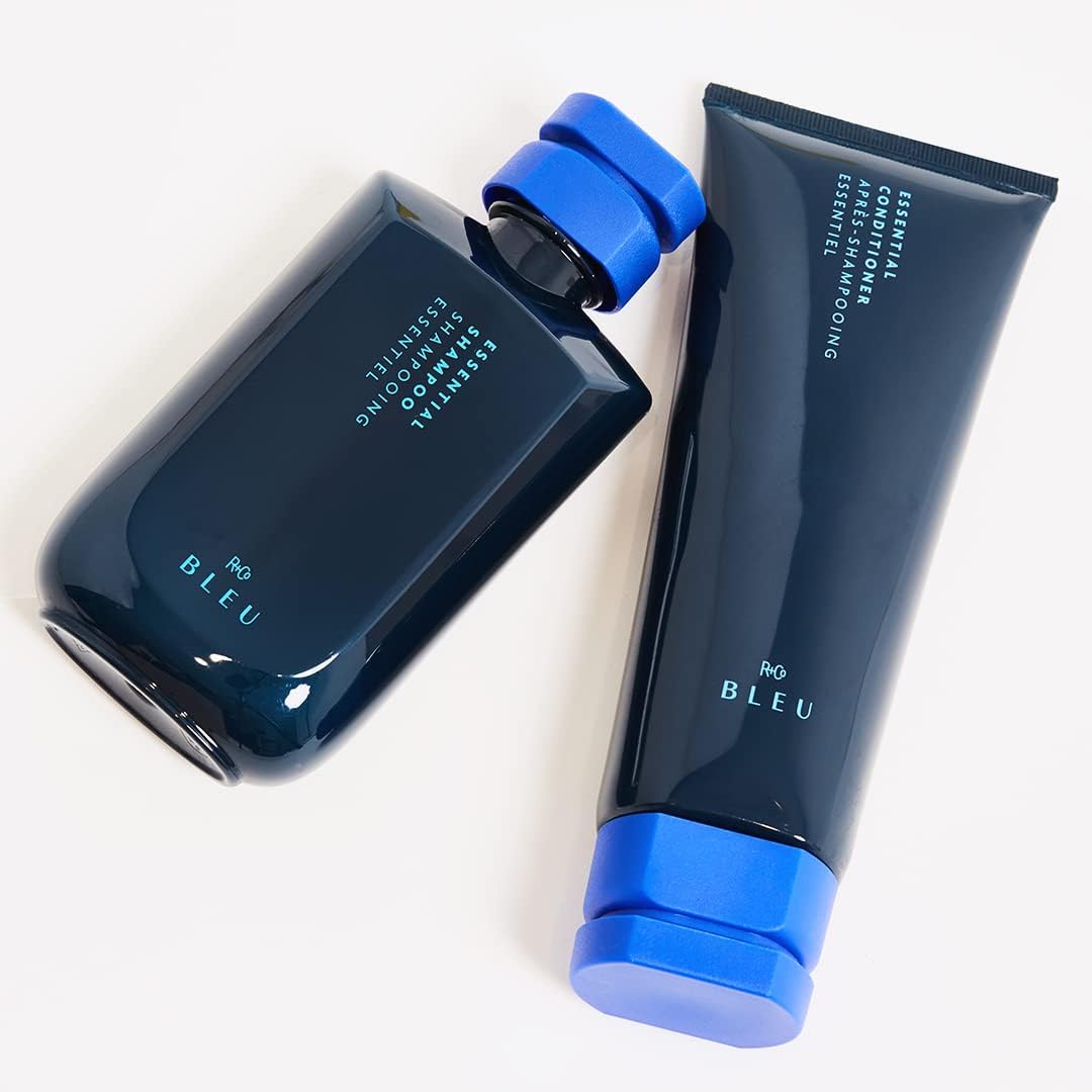 R+Co BLEU rich foam texture on palm showing gentle lather and moisturizing action