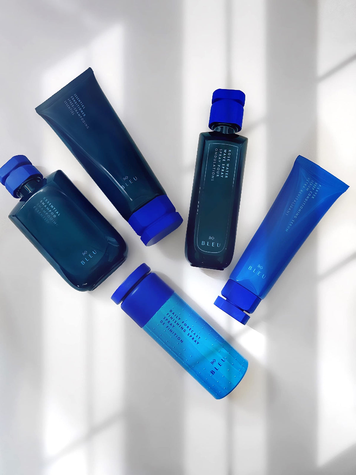 R+Co serum pump dispensing silky texture for effortless detangling