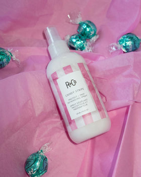 R+Co size comparison bottle for travel-friendly convenience