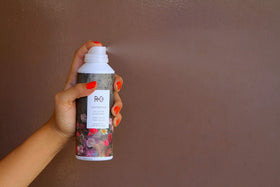R+Co Centerpiece being sprayed on damp hair to help detangle and smooth