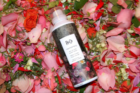 R+Co Centerpiece nozzle spraying mist to demonstrate effortless application