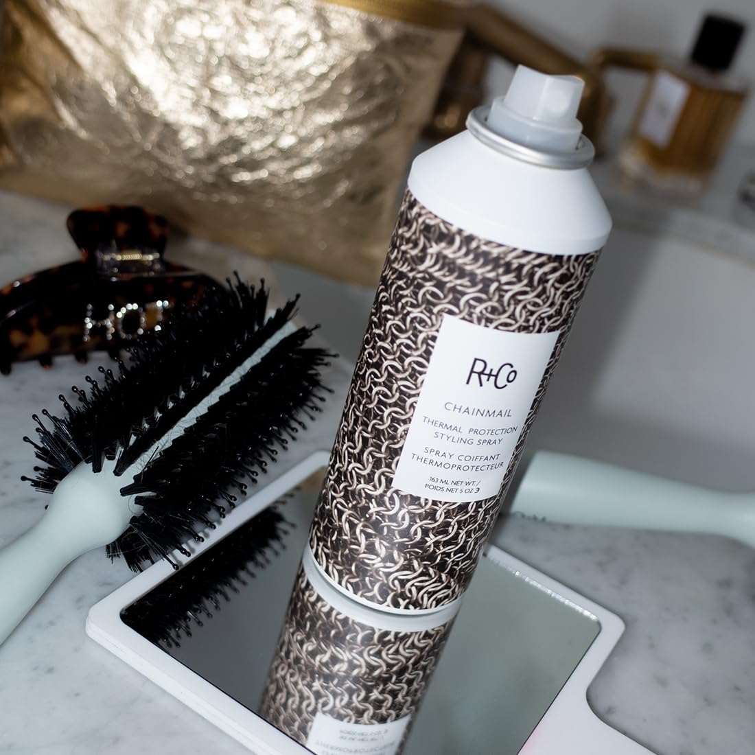 R+Co Chainmail shiny finish after styling highlighting luminous, weightless shine