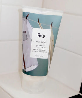 R+Co Cool Wind applied in hand demonstrating easy distribution and controlled styling effect