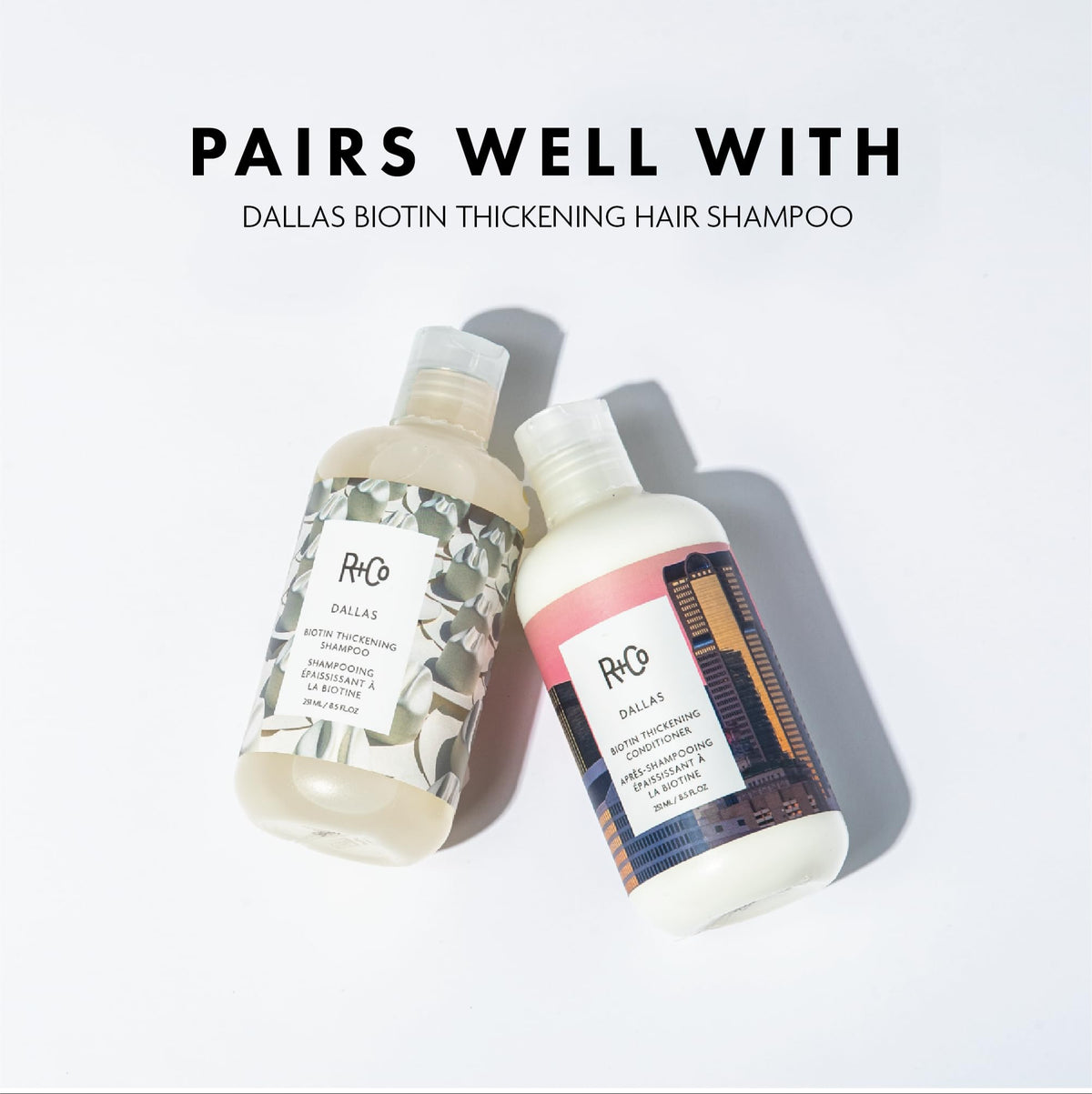 R+Co Dallas bottle in hand showing 8.5 oz scale and travel-friendly convenience