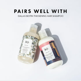 R+Co Dallas bottle in hand showing 8.5 oz scale and travel-friendly convenience