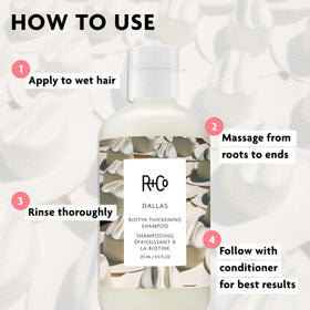 R+Co Dallas bottle next to styling tools suggesting heat protection and styling readiness