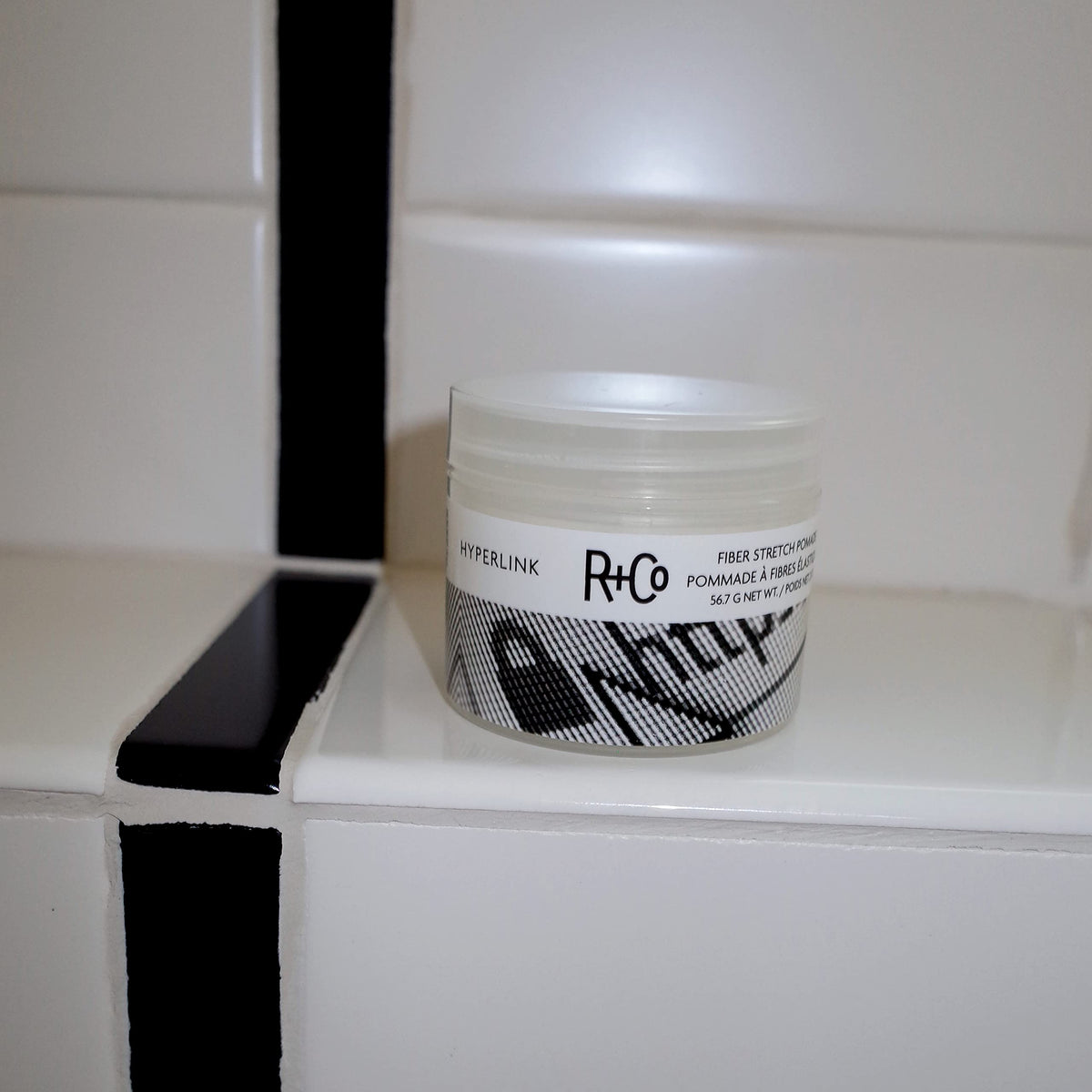 R+Co Hyperlink ingredients label closeup highlighting botanical benefits