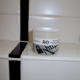 R+Co Hyperlink ingredients label closeup highlighting botanical benefits
