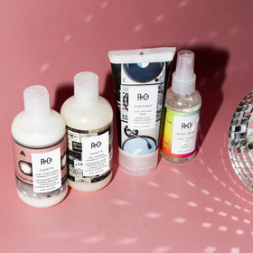 R+Co Mood Swing formula texture close-up highlighting lightweight finish and non-greasy shine