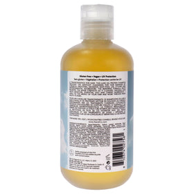 R+Co shampoo gel texture on hand highlighting moisture and lather