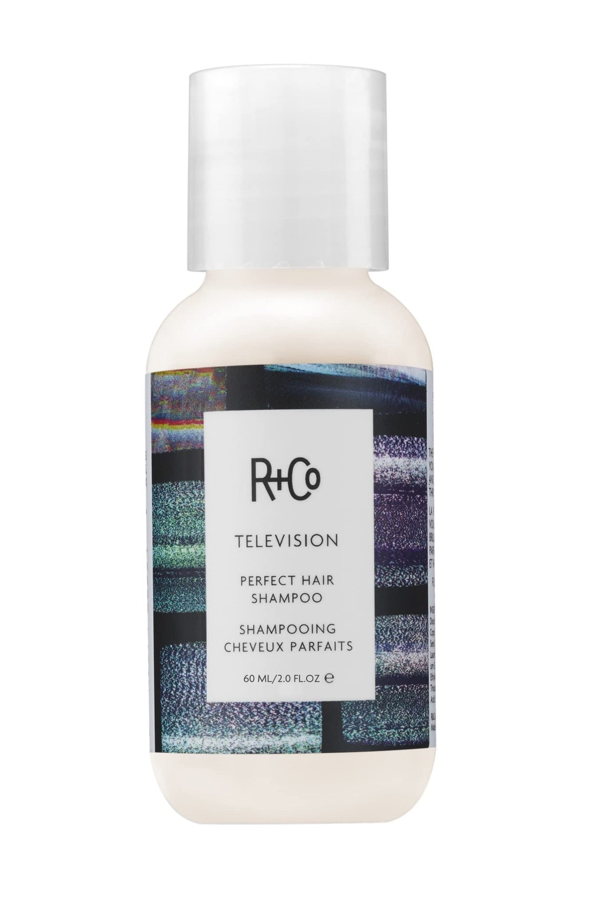 R+Co TELEVISION front packaging showing travel-friendly bottle and branding benefit