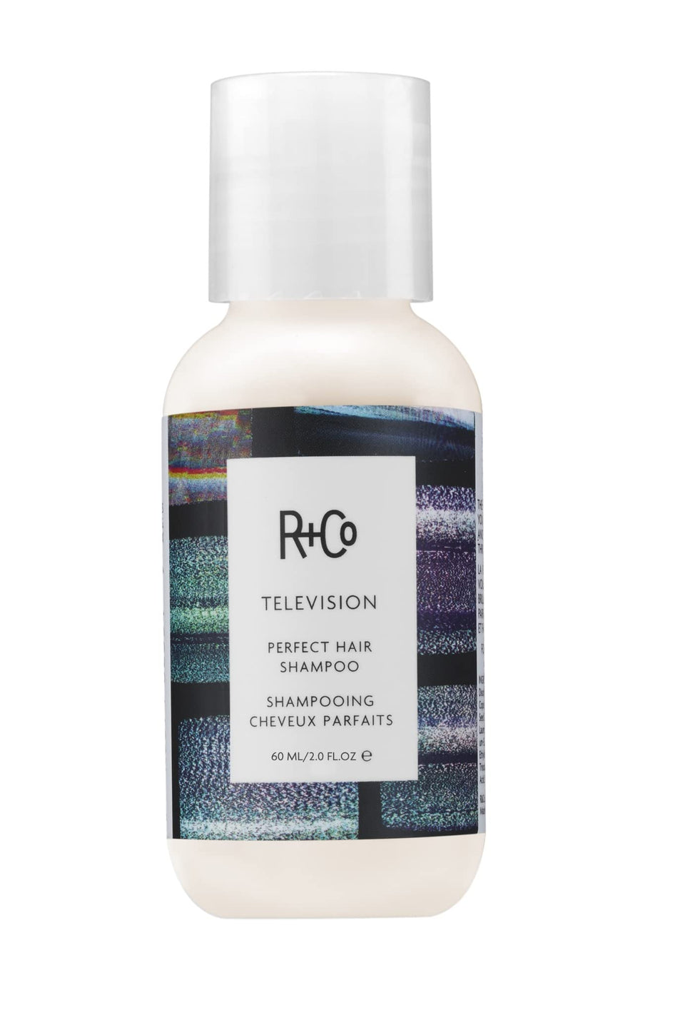 R+Co TELEVISION front packaging showing travel-friendly bottle and branding benefit